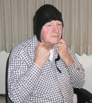 Michael Menkin wearing a thought screen helmet.